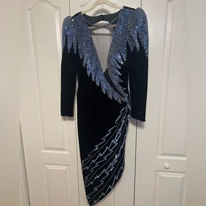 Hand sewn sequins and beads on a midnight blue velvet slit dress, mesh front.